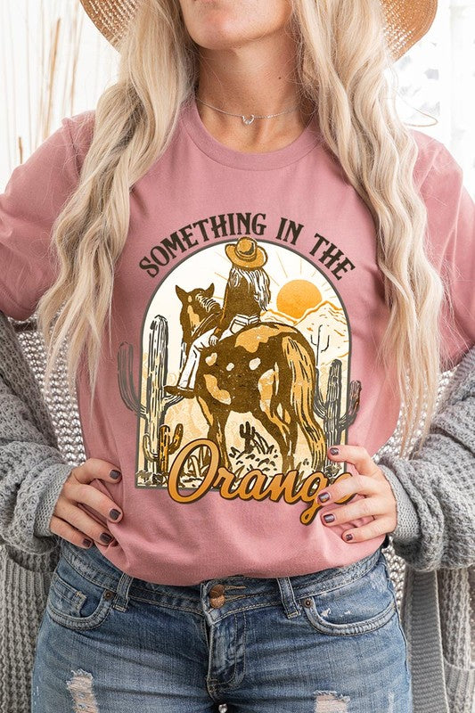 Something in the Orange Cowgirl Graphic Tee